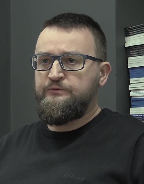 Portrait: Remigiusz Okraska